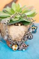 Get Your Kicks Cowgirl Silvertone Charm Bracelet